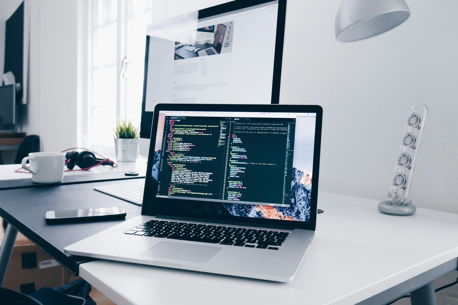 A laptop on a bright desk — the starting point for ConnectionCafe.com tech guides